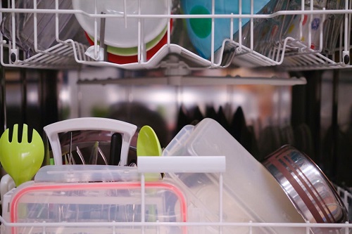 A dishwasher filled with clean dishes