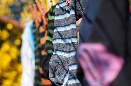 Socks drying on a washing line outdoors